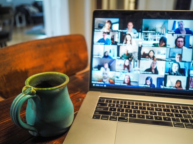 An introvert attending meeting while working from home.